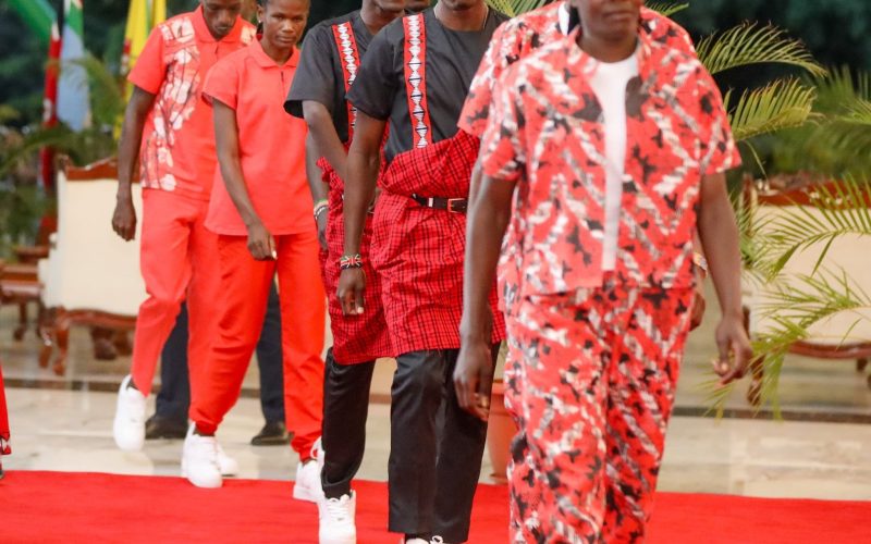 Athletes showcase Kenya's local made ceremonial kit. PHOTO/@moyasa_ke/X