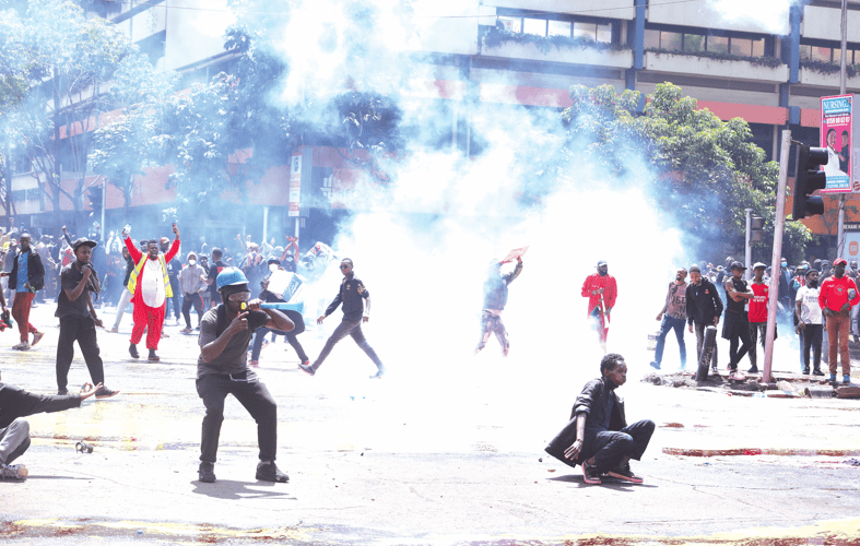 Protestors engage police along Kenyatta Avenue during the anti-tax demos in Nairobi. PHOTO/Bernard Malonza