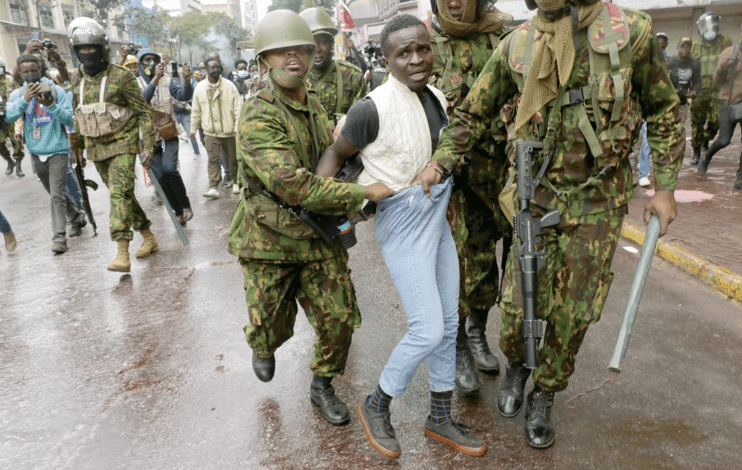 A young anti-Government protester is arrested by officers from the dreaded General Service Unit (GSU) on Moi Avenue in Nairobi on Tuesday July 16, 2024. PHOTO/kenna claude