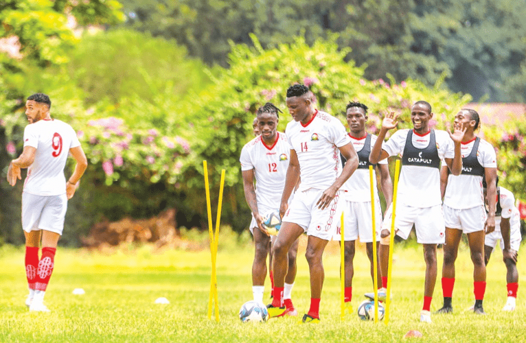 Harambee Stars captain Micahel Olunga (centre) dribbles the ball during a past team training. Kenya will kick off their 2025 Afcon qualifiers against Zimbabwe. PHOTO/Rodgers Ndegwa