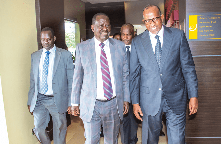 Raila Odinga and Environment Cabinet Secretary Aden Duale after addressing participants during a High-Level Forum of Africa Green Climate Finances National Designated Authorities Network (AfDAN)at a Nairobi Hotel. PHOTO/Philip Kamakya