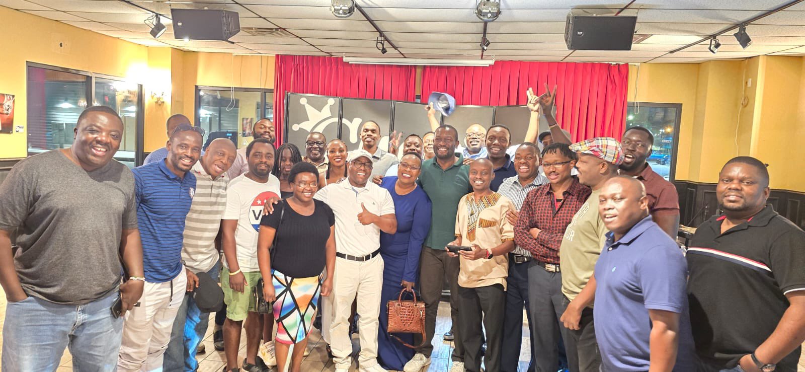 Nairobi Senator Edwin Sifuna poses for a photo with Kenyans living in Houston. PHOTO/@edwinsifuna/X