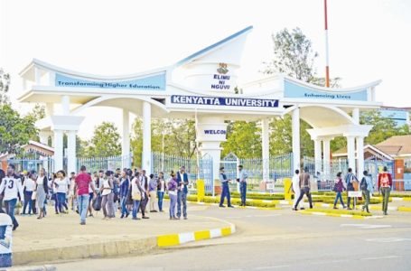 Kenyatta University students at the institution’s entrance. PHOTO/Print