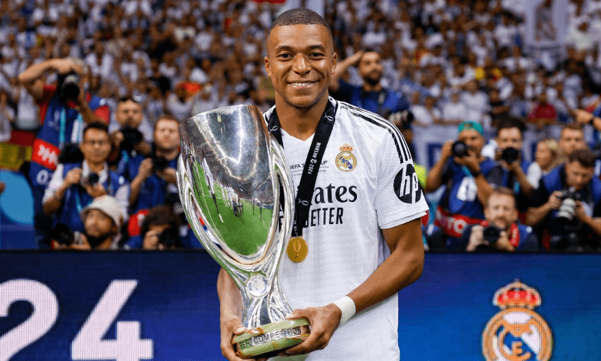 Real Madrid player Kylian Mbappe holding the Super Cup on Wednesday, August 14, 2024. PHOTO/@KMbappe/X