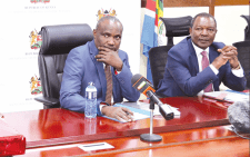 Treasury Cabinet Secretary John Mbadi (left) with his predecessor Prof. Njuguna Ndung’u at the Treasury Building offices in Nairobi. PHOTO/Kenna Claude