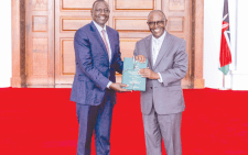 President William Ruto receives the Shakahola taskforce report from Mutava Musyimi at State House on July 30. The Taskforce was named after the shocking revelations over deaths reported in the forest in Kwale forest. PHOTO/PCS