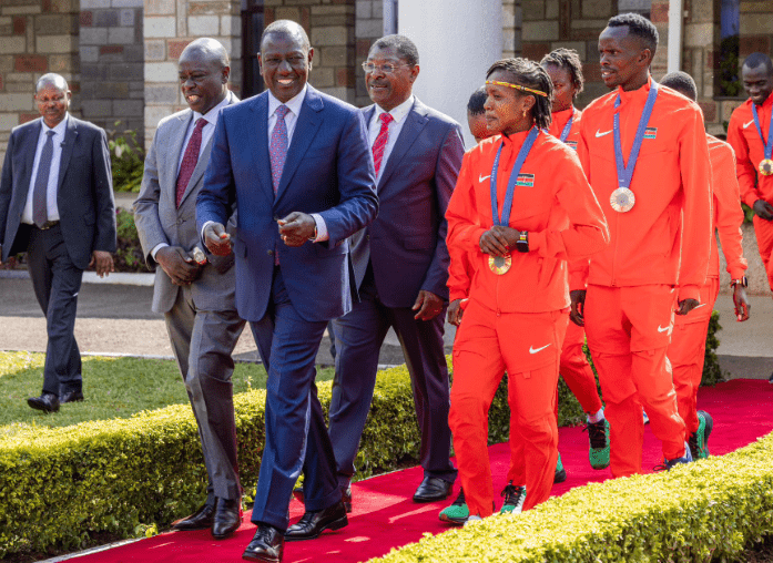 President William Ruto with athletes who represented Kenya at the Paris Olympic Games. PHOTO/@WilliamsRuto/X