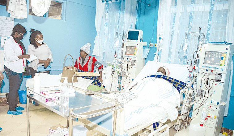 Medics attend to a patient at Kenyatta Hospital. PHOTO/ Philip Kamakya