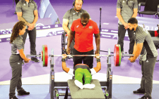 Para-powerlifter Hellen Wawira in action during the Games. PHOTO/James Waindi