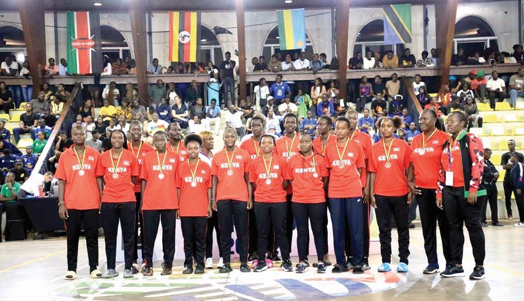 Kenya’s national basketball men’s and women’s team players pose for a joint photo session at the end of a Africa Continental tournament. PHOTO/KBF