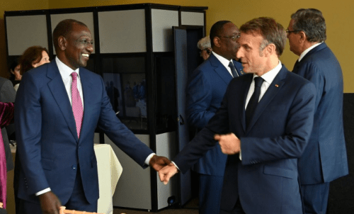 President Emmanuel Macron and President William Ruto chat. PHOTO/@HusseinMohamedg/X