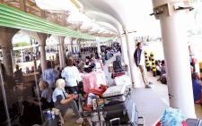 Some of the stranded passengers at Jomo Kenyatta international Airport in Nairobi yesterday . PHOTO/BERNARD MALONZA