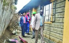 Interior CS Kithure Kindiki with DCI officers and Red Cross officials on Friday at the scene of a fire at Hillside Endarasha Academy that killed 21 children in a dormitory on Thursday night. PHOTO/Joseph Kong'ori