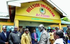 Education Principal Secretary Belio Kipsang with other officials at Hillside Endarasha Academy in Nyeri county on September 6, 2024, the day after a fire gutted a dormitory at the school and killed 21 students. PHOTO/Print