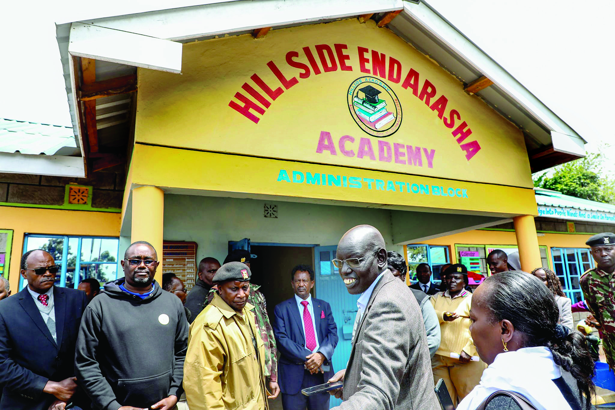 Education Principal Secretary Belio Kipsang with other officials at Hillside Endarasha Academy in Nyeri county on September 6, 2024, the day after a fire gutted a dormitory at the school and killed 21 students. PHOTO/Print