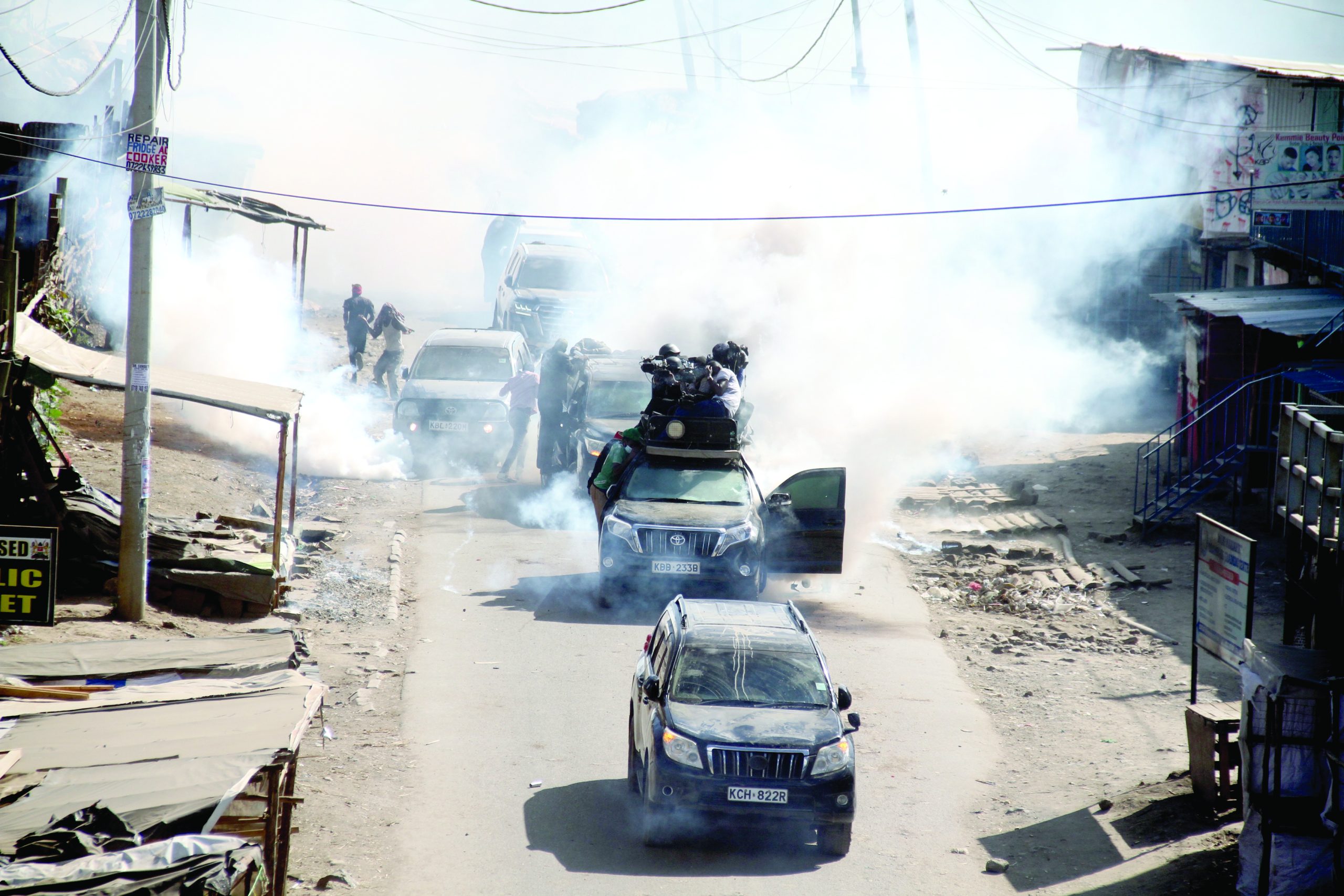 Azimio la Umoja leader Raila Odinga’s convoy was gassed by Anti-riot police security officers at the Quarry area of Embakasi in Nairobi on March 29,2023 as they dispersed protesters after the demonstrations turned chaotic. PHOTO/Print