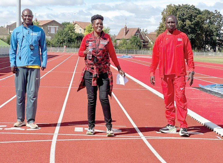 R-L: Team Kenya Paralympic head coach Henry Kirwa, Ruth Ndalut and Abraham Tarbei. PHOTO/JAMES WAINDI