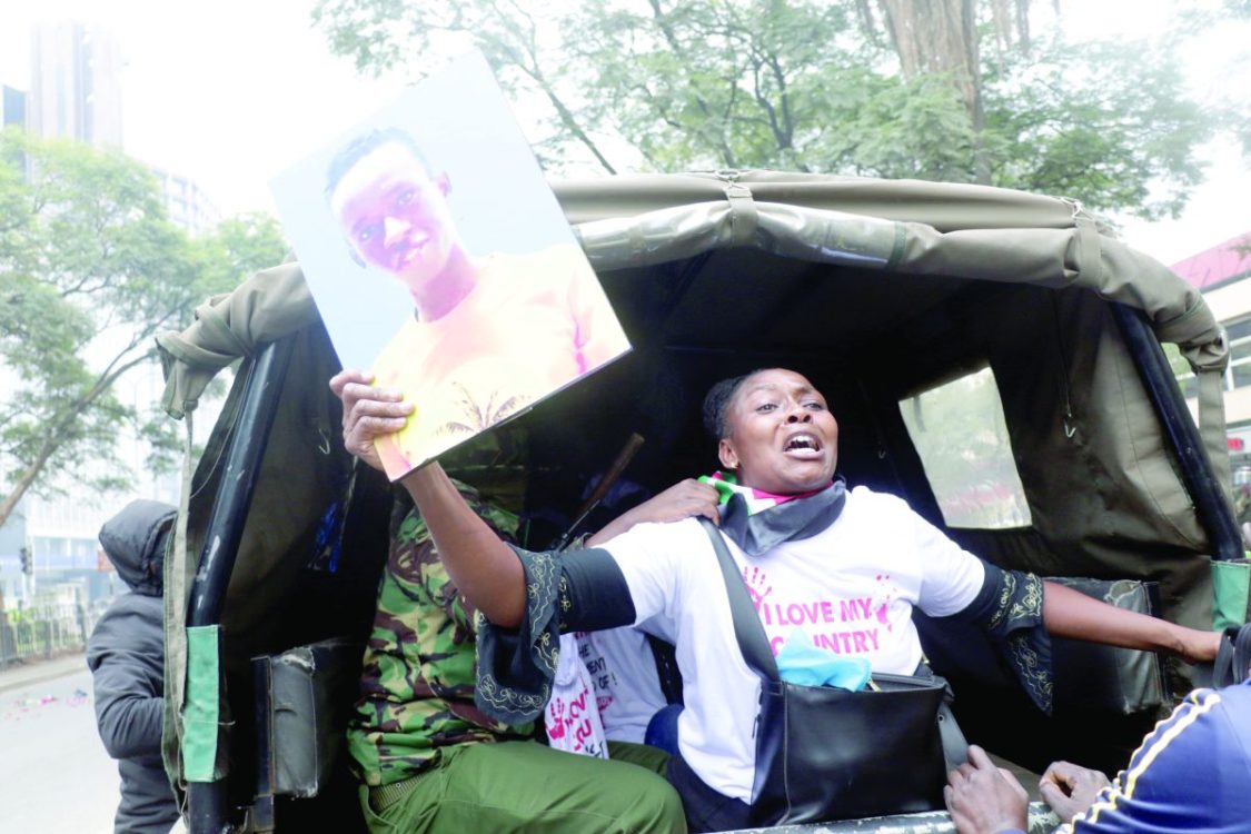 A woman arrested during the June 25, 2024 protests on Kenyatta Avenue in Nairobi moments after some Kenyans started protesting over police killings. PHOTO/Kenna Claude