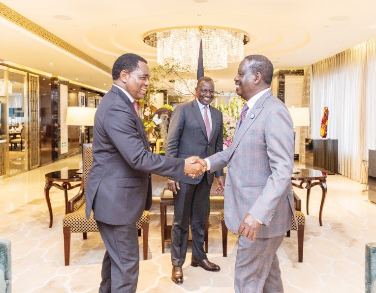 Zambia President Hakainde greets Former Prime Minister Raila Odinga as President William Ruto looks on, on the sidelines of the Forum on China-Africa Cooperation (FOCAC) Summit in Beijing, China. PHOTO/XINHUA