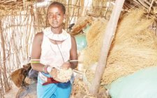 Uyam Learpora, a 36-year-old mother of seven children from Nakwamur village in Samburu County at her pasture storage. PHOTO/mathew ndung’u