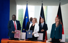 German Minister of Interior Nancy Faeser and Kenya's Foreign Affairs CS Musalia Mudavadi display the labour mobility agreement signed on Friday, September 13, 2024, as President William Ruto and German Chancellor Olaf Scholz look on. PHOTO/@BMI_Bund/X