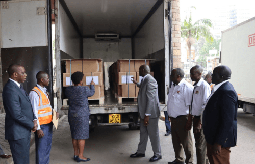 Director General of Immigration Evelyn Cheluget and Principal Secretary State Department for Immigration Julius Bitok receive neww passport booklets in Nairobi on August 13, 2024. PHOTO/@ImmigrationDept/X
