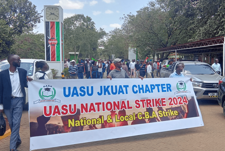 JKUAT University Academic Staff Union (UASU) members protest at the school premises on Wednesday, September 18, 2024. PHOTO/ Oliver Musembi