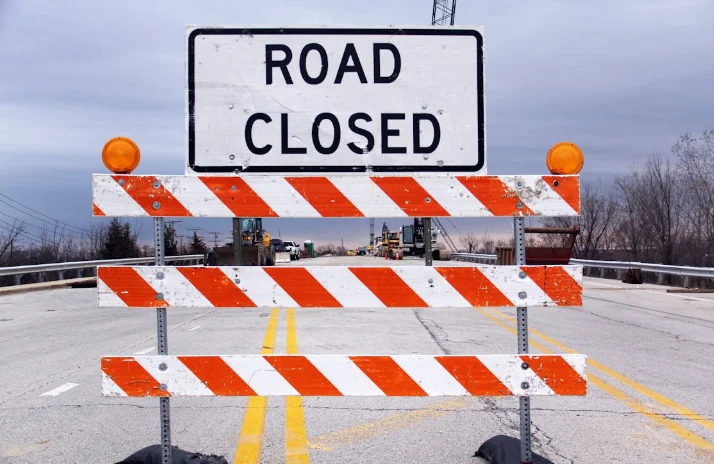 A caution sign in the middle of a road. Image used for representation only. PHOTO/Pexels