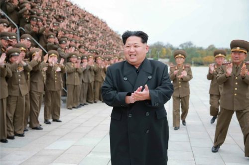 North Korean Supreme Leader Kim Jong Un seen with military officers.
