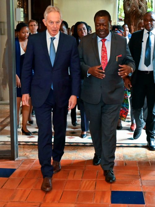 Prime Cabinet Secretary Musalia Mudavadi walks along with former United Kingdom (UK) Prime Minister Tony Blair during their meeting. PHOTO/@MusaliaMudavadi/X