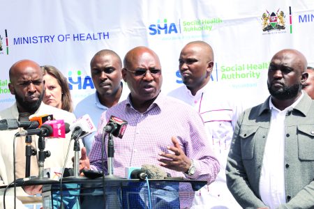 Principal Secretary for the State Department of Medical Services, Harry Kimtai (centre) with Social Health Authority (SHA) chairman Abdi Mohammed (right) among other Health stakeholders during a press briefing in Nairobi. PHOTO/Bernard Malonza