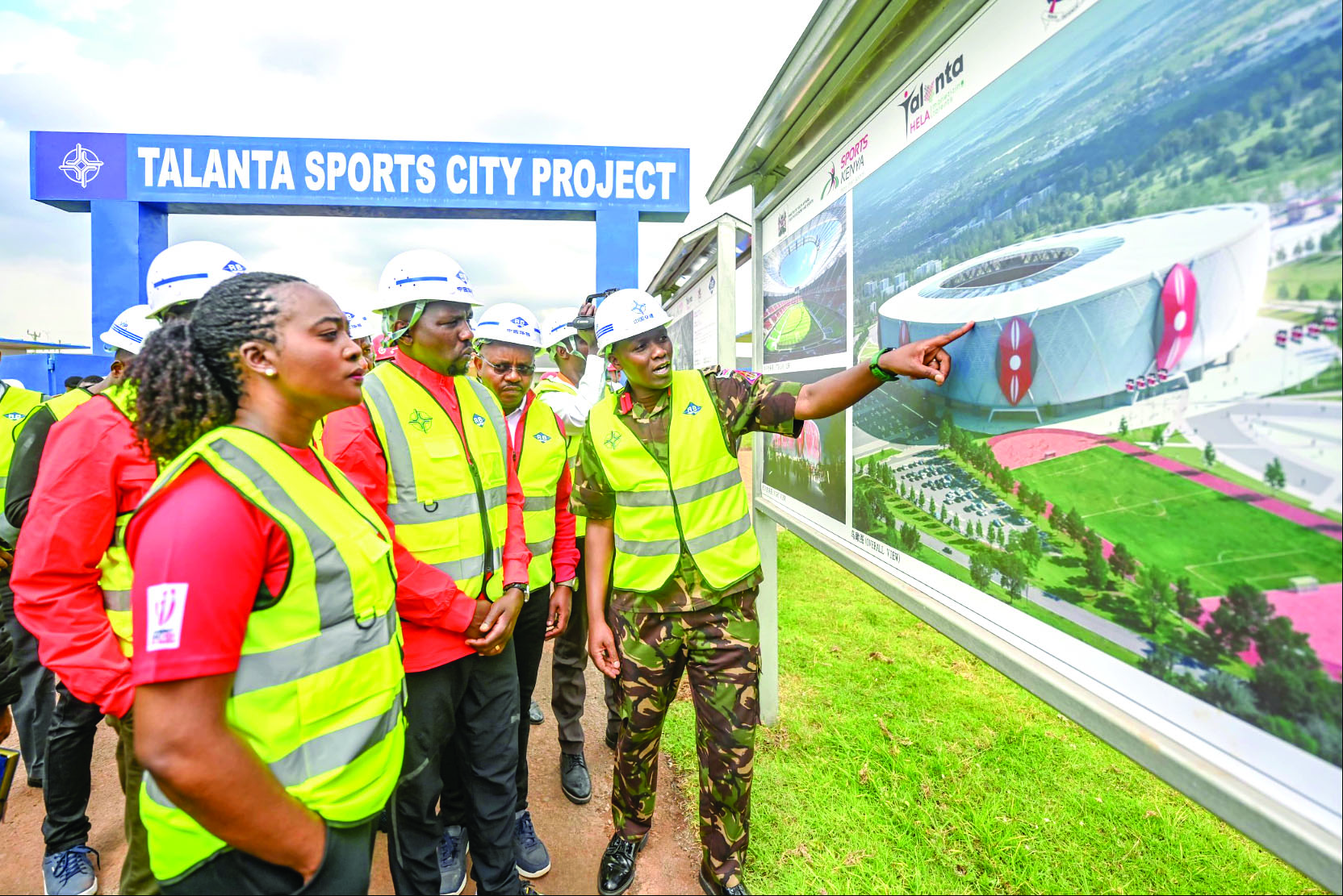 Youth Affairs, Creative Economy and Sports  Cabinet Secretary Kipchumba Murkomen (centre) and Defence CS Soipan Tuya view an artist’s impression of the Talanta Sports City project recently. PHOTO/Print