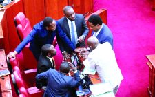 Members of the Senate huddle in consutlations during Deputy President Rigathi Gachgua’s impeachment trial yesterday. PHOTO/KENNA CLAUDE