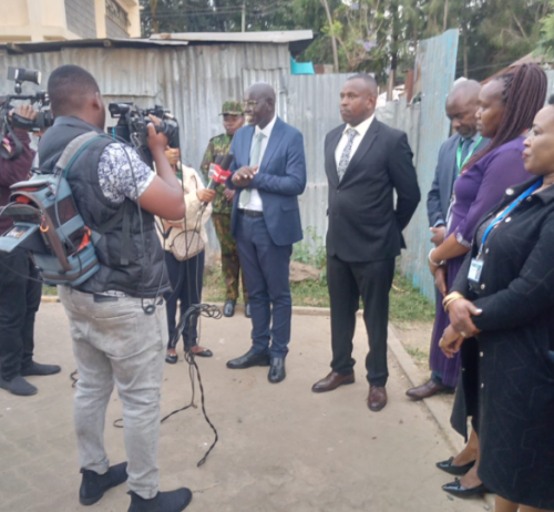 Education PS Belio Kipsang speaks to journalists at Lang'ata West during the distribution of exam papers. PHOTO/@EduMinKenya/X