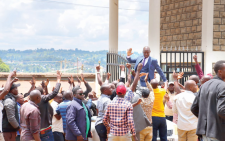 Nyamira County Assembly Speaker Enock Okero is blocked from entering the Assembly precincts yesterday. He was suspended last week for gross misconduct. PHOTO/Evans Nyakundi