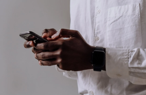 a man holds a black smartphone. Image used for representation only. PHOTO/Pexel