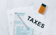 Tax documents on a table. Image used for representation only. PHOTO/Pexels