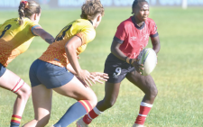 Kenya Lionesses scrum half Edith Naliaka in action against Costa Blanca Barbarians during the recent Safari 7s cup final at the Machakos Stadium. PHOTO/Alex Njue