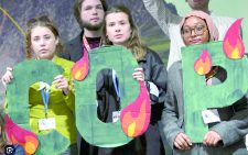 Activists take part in a demonstration against fossil fuels at the COP29 UN Climate Summit, on Friday.PHOTO/Print