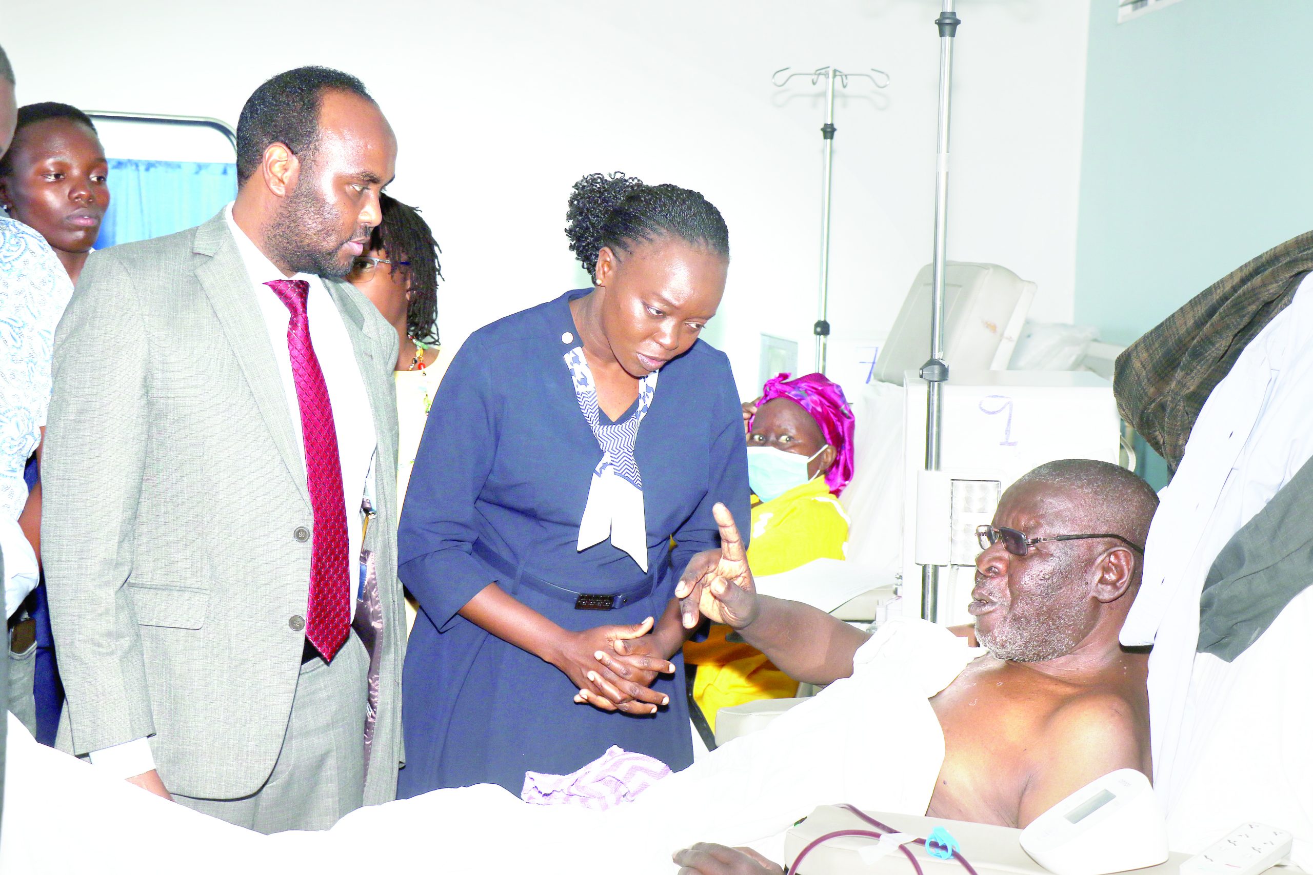 Health Cabinet Secretary Deborah Barasa speaks with Sublime Dialysis Centre patient Mzee James Kanyore when she visited the Nakuru facility on October 7 to check the progress of the SHIF rollout. Many patients said they had to pay from their own pockets because the system was not working. PHOTO/Raphael Mungeri