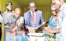 Education CS Julius Migos Ogamba when he oversaw the distribution of KCSE papers at the Nyali Deputy county commissioner’s offices in Mombasa yesterday PHOTO/RUEBEN MWAMBINGU