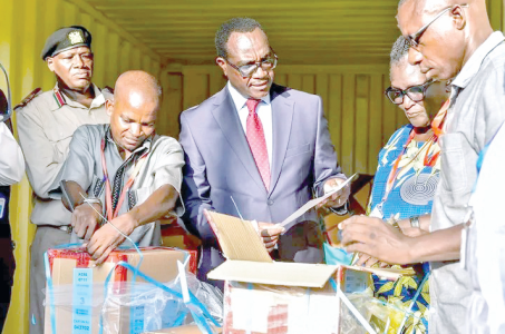 Education CS Julius Migos Ogamba when he oversaw the distribution of KCSE papers at the Nyali Deputy county commissioner’s offices in Mombasa yesterday PHOTO/RUEBEN MWAMBINGU