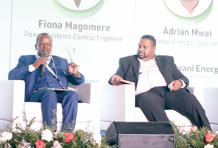 Director Renewable Energy-Ministry of Energy and Petroleum Benson Mwakina (left) with Senior accounts manager Sungrow South Africa Prinaven Naidoo during the conference in Nairobi yesterday. PHOTO/Bernard Malonza