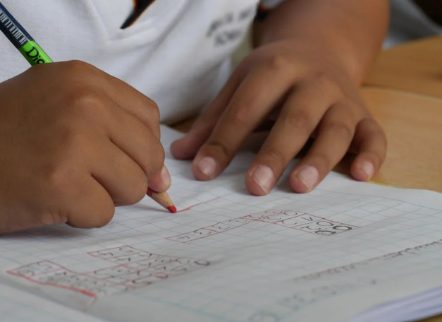 Child doing homework. Image used for illustration purposes. PHOTO/Pexels