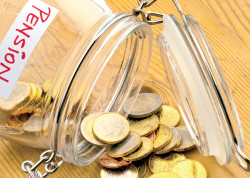 Coins in a jar. Image used for illustration purposes only.