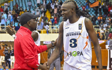 Sports CS Kipchumba Murkomen chats with a Nairobi City Thunder's player after they beat South Africa on December 3, 2024. PHOTO/@kipmurkomen/X