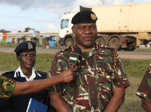 National Police spokesperson Resila Onyango looks on as Deputy IG Gilbert Masengeli speaks to the press. PHOTO/@npsofficial_KE/X