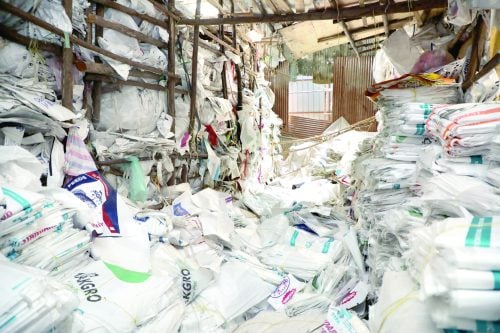 A section of the 19,000 counterfeit fertiliser bags seized by the Anti-Counterfeit Authority during a police raid in Nairobi yesterday. PHOTO/BERNARD MALONZA