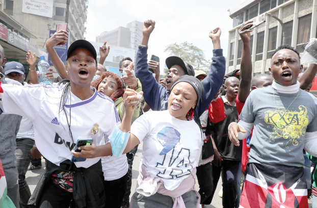 Gen Z protesters when they barricaded a section of Mama Ngina Street in Nairobi on July 23, 2024. PHOTO/ Bernard Malonza