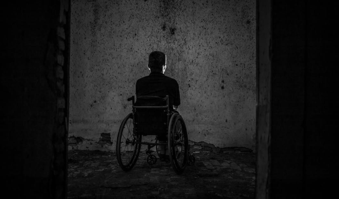 A person sitting on a wheelchair used for representation. PHOTO/Pexels